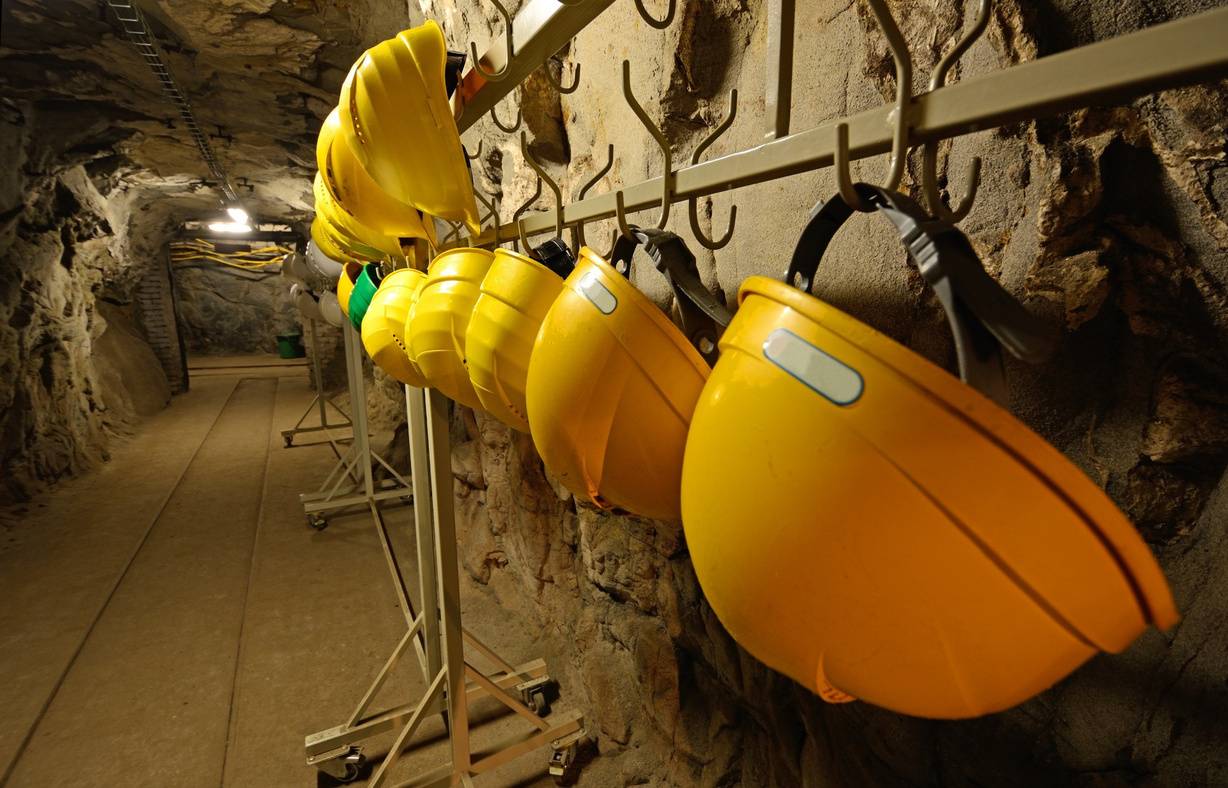 Safety helmets stored in an underground mining tunnel